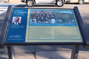 Pictured here is A Vibrant by Segregated Community State Marker