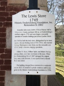 Picture of the sign outside of the Lewis Store