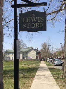 Picture of sign outside of the Lewis Store