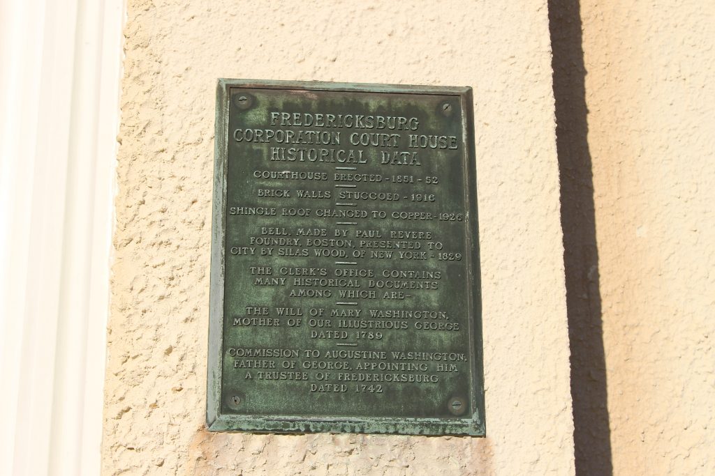 pictured here is cooperation courthouse's building plaque for historical data
